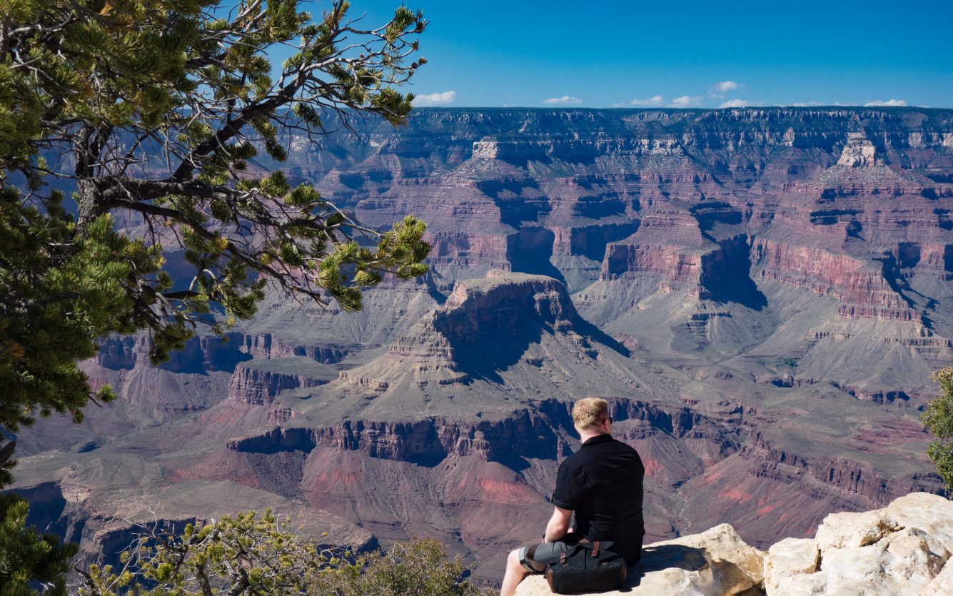 Grand Canyon - vast canyon layers glowing at golden hour